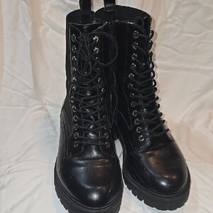 Torrid Black Combat Boots with Lace-Up Design